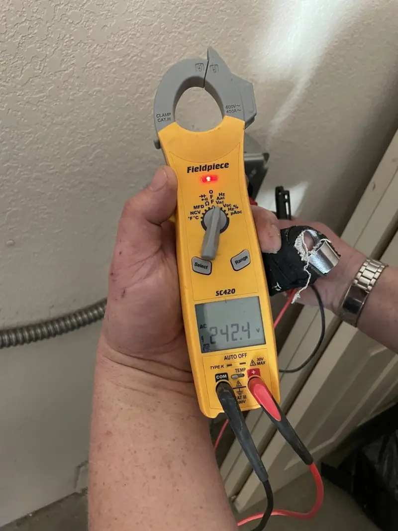 Voltage testing with clamp meter during Outlet Installation in Soquel